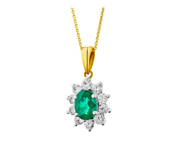 Yellow and white gold pendant with brilliants and emerald - fineness 585