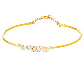 Stiff gold bracelet with cubic zirconia and a clasp