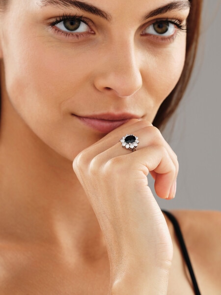 White gold ring with brilliants and sapphire - fineness 14 K