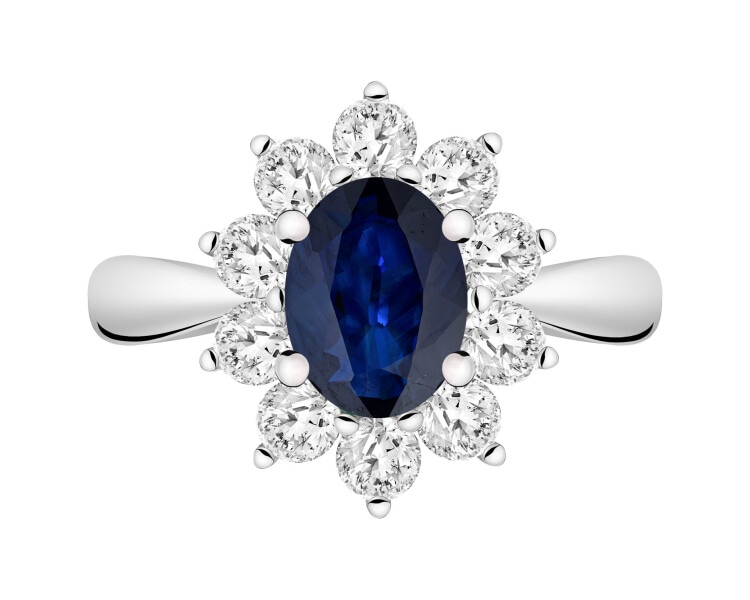 White gold ring with brilliants and sapphire - fineness 14 K