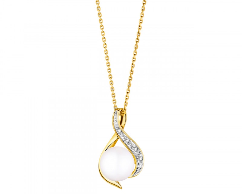 Yellow gold pendant with diamonds and pearl - fineness 9 K