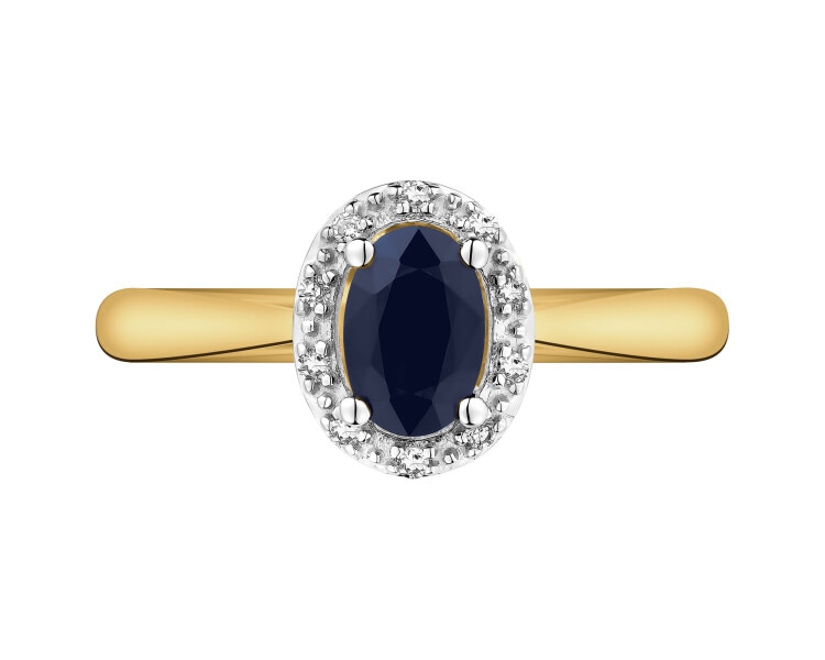 Yellow gold ring with diamonds and sapphire - fineness 14 K