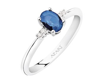 White gold ring with diamonds and sapphire - fineness 9 K