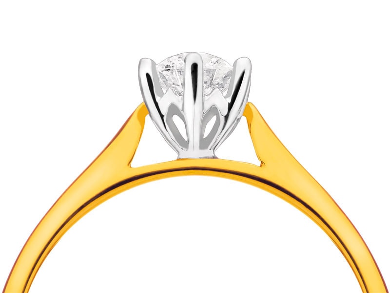Yellow and white gold ring with brilliant 0,44 ct - fineness 585