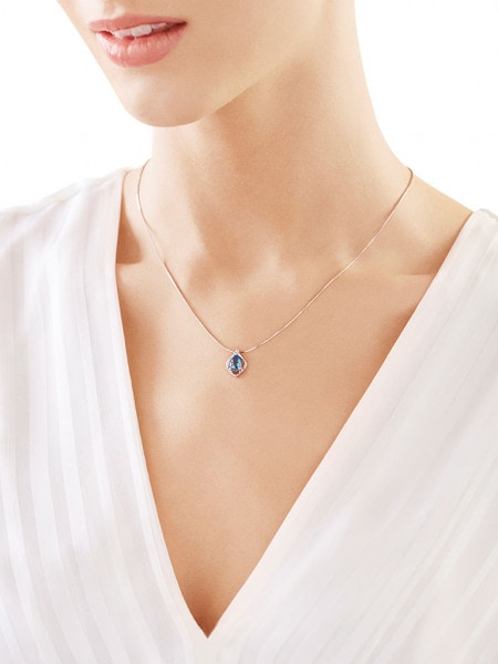 White gold pendant with diamond and topaz (London Blue) - fineness 9 K