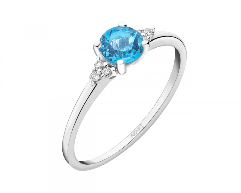 White gold ring with brilliants and topaz - fineness 14 K