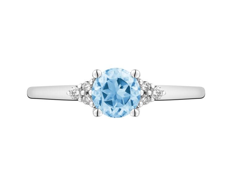 White gold ring with brilliants and topaz - fineness 14 K