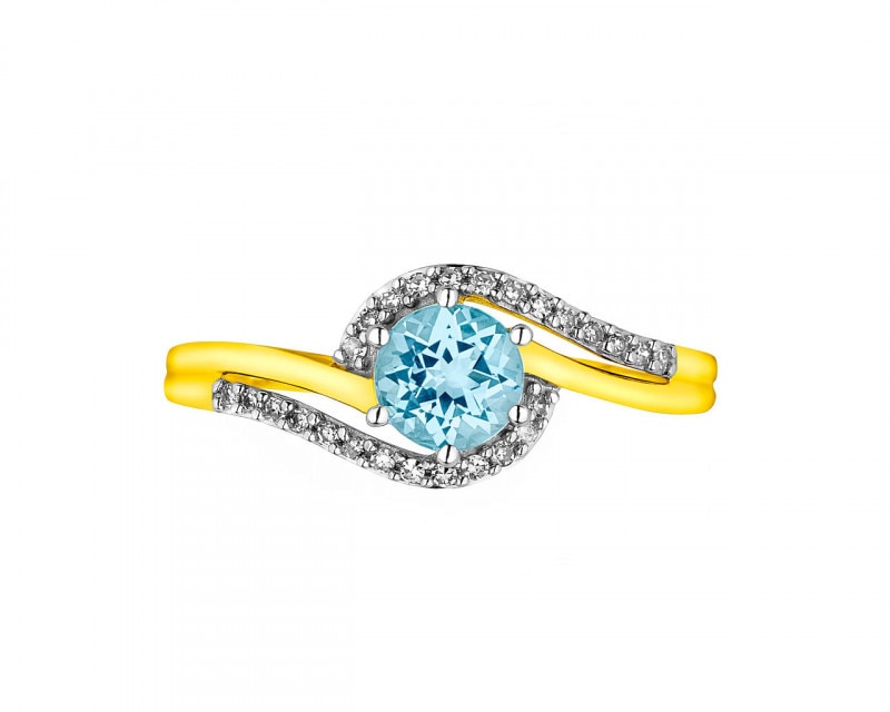 Yellow gold ring with diamonds and topaz - fineness 14 K