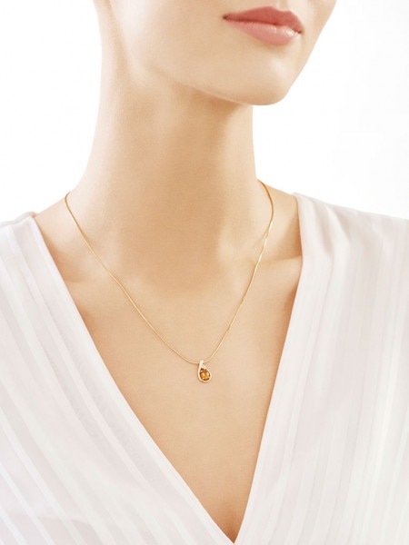 Yellow gold pendant with brilliant and citrine - fineness 9 K