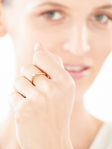 Prsten ze žlutého a bílého zlata s briliantem 0,12 ct - ryzost 585