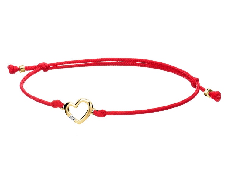Bransoletka z elementami żółtego złota i diamentem - serce - 0,004 ct - próba 375