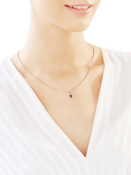 White gold pendant with brilliant and sapphire - fineness 14 K