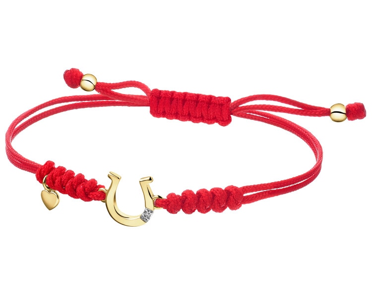 Bransoletka z elementami żółtego złota i diamentem - 0,004 ct - próba 375