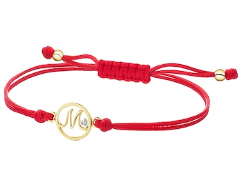 Bransoletka z elementami żółtego złota i diamentem - litera M - 0,003 ct - próba 375