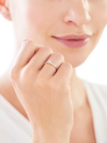 Prsten  ze žlutého a bílého zlata s briliantem - 0,08 ct - ryzost 585