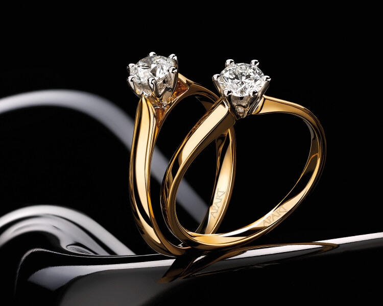 Prsten  ze žlutého a bílého zlata s briliantem - 0,08 ct - ryzost 585