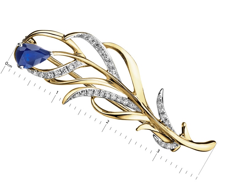 Broszka z żółtego złota z diamentami i szafirem - piórko - próba 585