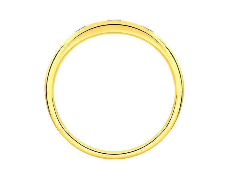 Pierścionek z żółtego złota z diamentami i rubinami syntetycznymi - próba 375