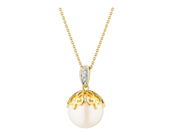 Colgante de oro amarillo con diamantes y perla></noscript>
                    </a>
                </div>
                <div class=