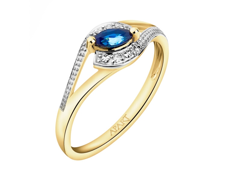 Yellow gold ring with diamonds and sapphire - fineness 9 K