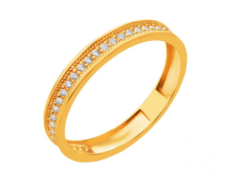 Yellow gold ring with cubic zirconias