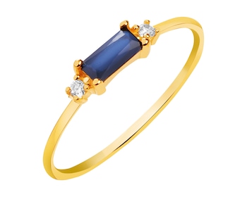 Yellow gold ring with synthetic sapphire and cubic zirconia