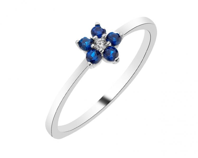 Stříbrný prsten se zirkony - květ