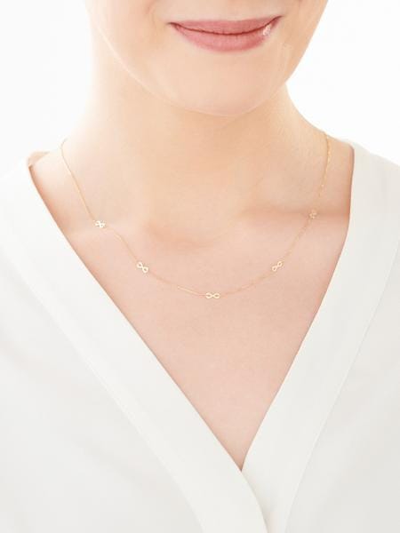 Yellow gold necklace with cubic zirconia - infinity