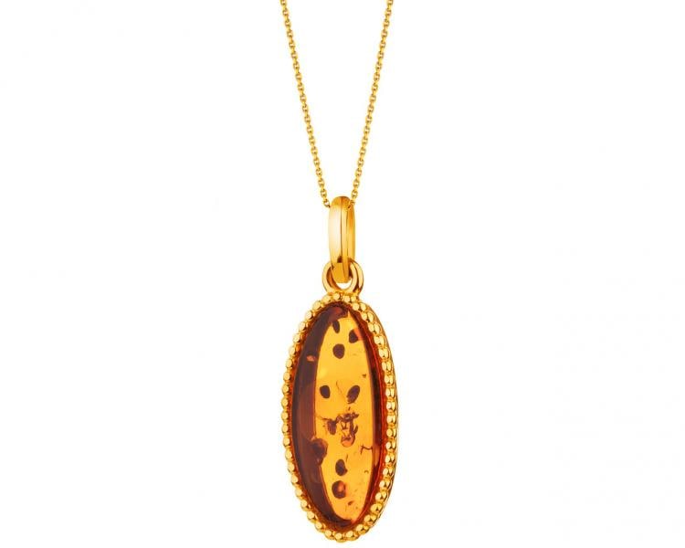 Yellow gold pendant with amber