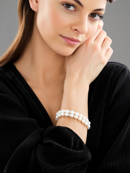 Pearl bracelet with white gold elements and diamonds - fineness 18 K