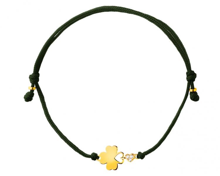 Bracelet with elements of yellow gold and cubic zirconia - clover