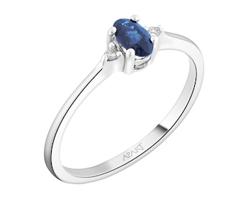 White gold ring with brilliants and sapphire - fineness 18 K