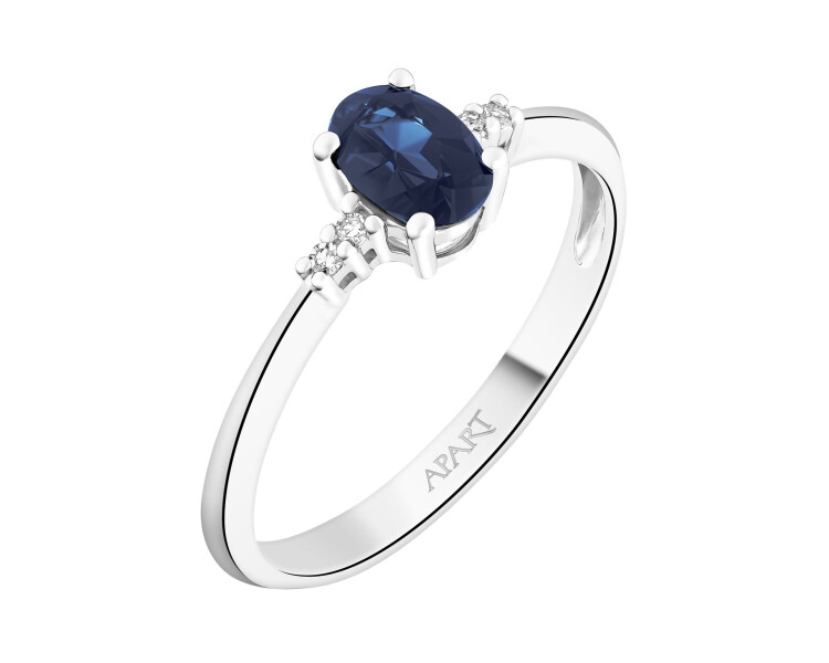White gold ring with diamonds and sapphire - fineness 18 K