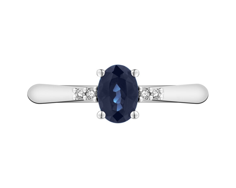 White gold ring with diamonds and sapphire - fineness 18 K