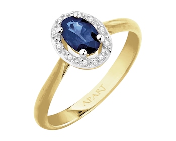 Yellow gold ring with diamonds and sapphire - fineness 18 K
