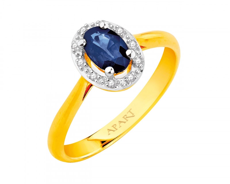 Yellow gold ring with diamonds and sapphire - fineness 18 K