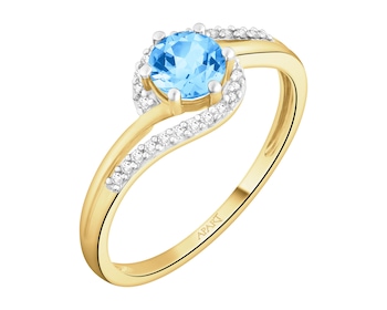 Yellow gold ring with diamonds and topaz - fineness 18 K