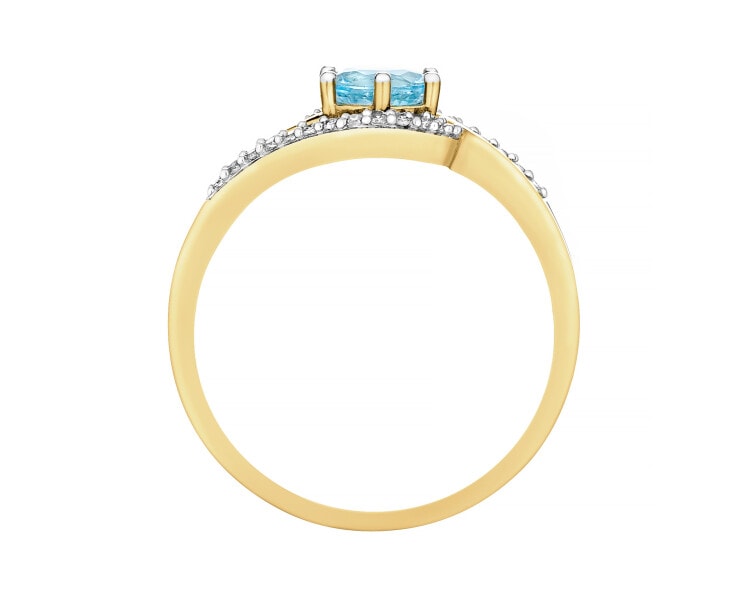 Yellow gold ring with diamonds and topaz - fineness 18 K