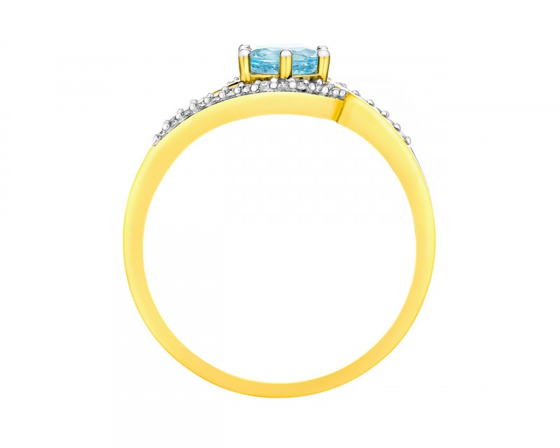 Yellow gold ring with diamonds and topaz - fineness 18 K