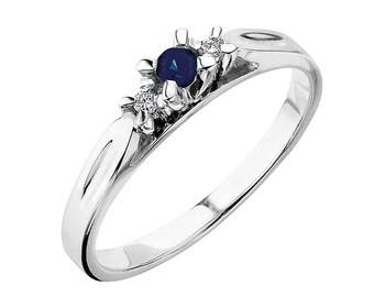 White gold ring with brilliants and sapphire - fineness 9 K