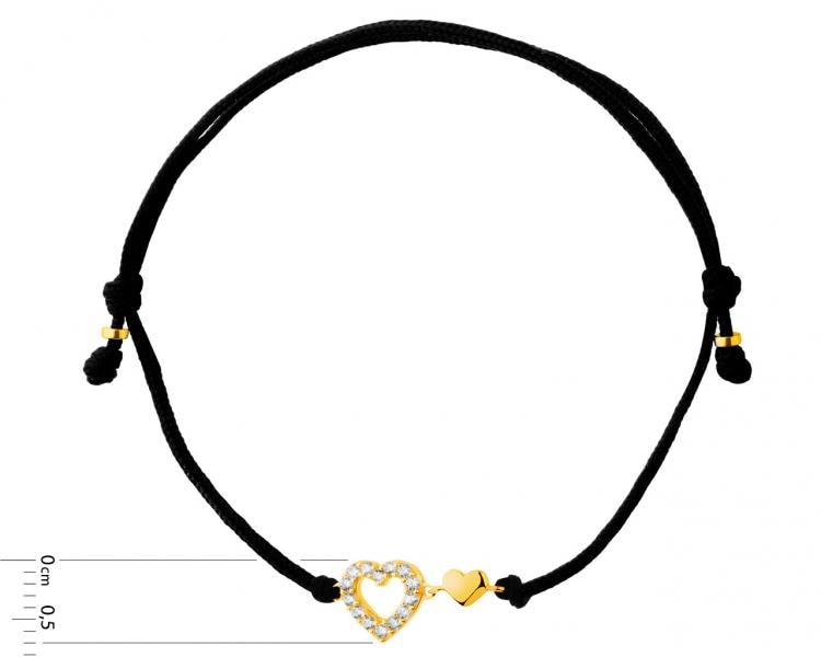 Bracelet with elements of yellow gold and cubic zirconia - hearts