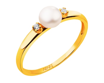 Zlatý prsten s perlou a zirkony></noscript>
                    </a>
                </div>
                <div class=