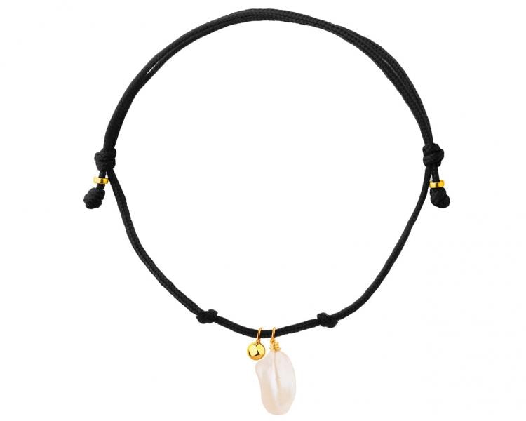 Bracelet with elements of yellow gold and pearl - ball
