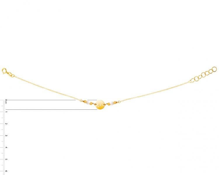 Złota bransoletka z perłami, ankier - koło, litera A