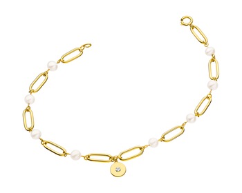 Bransoletka z żółtego złota z diamentem i perłami - koło></noscript>
                    </a>
                </div>
                <div class=
