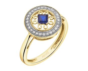 Ring made of white gold with diamonds and sapphire - fineness 14 K