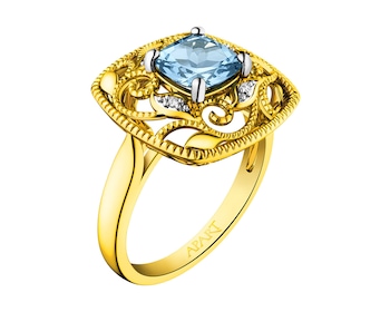 Pierścionek z żółtego złota z diamentami i topazem (London Blue) 0,01 ct - próba 585