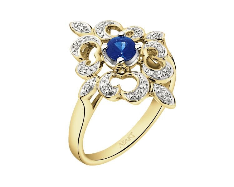 Ring made of white gold with diamonds and sapphire - fineness 14 K