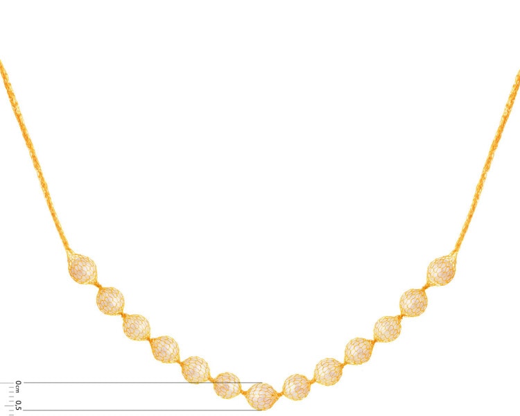 Złoty naszyjnik z perłami