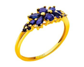 Złoty pierścionek z szafirami syntetycznymi - kwiaty